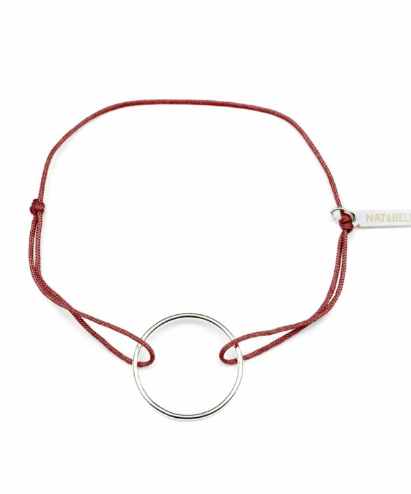 Pulsera de hilo Energyu Circle con aro de plata de ley 925 , hecha a mano y disponible en varios colores.