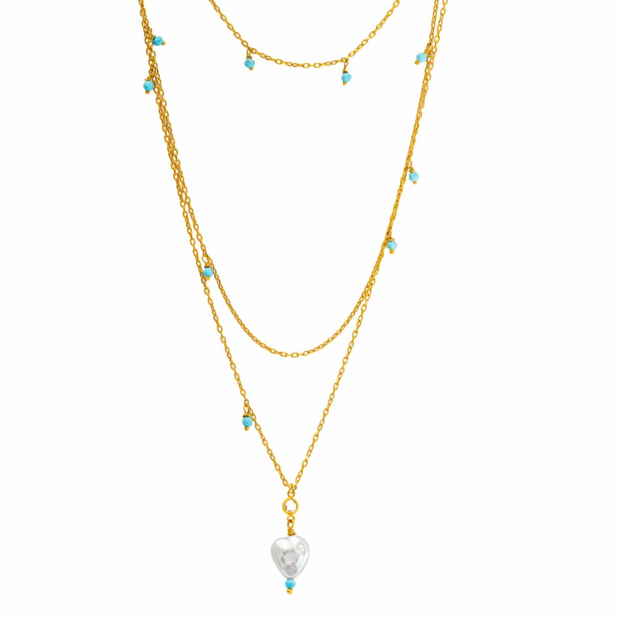 Collar Corazón del Mar con cuentas facetadas de turquesa y colgante de perla barroca natural.
