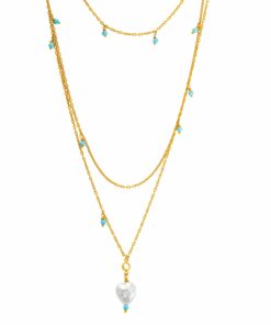 Collar Corazón del Mar con cuentas facetadas de turquesa y colgante de perla barroca natural.
