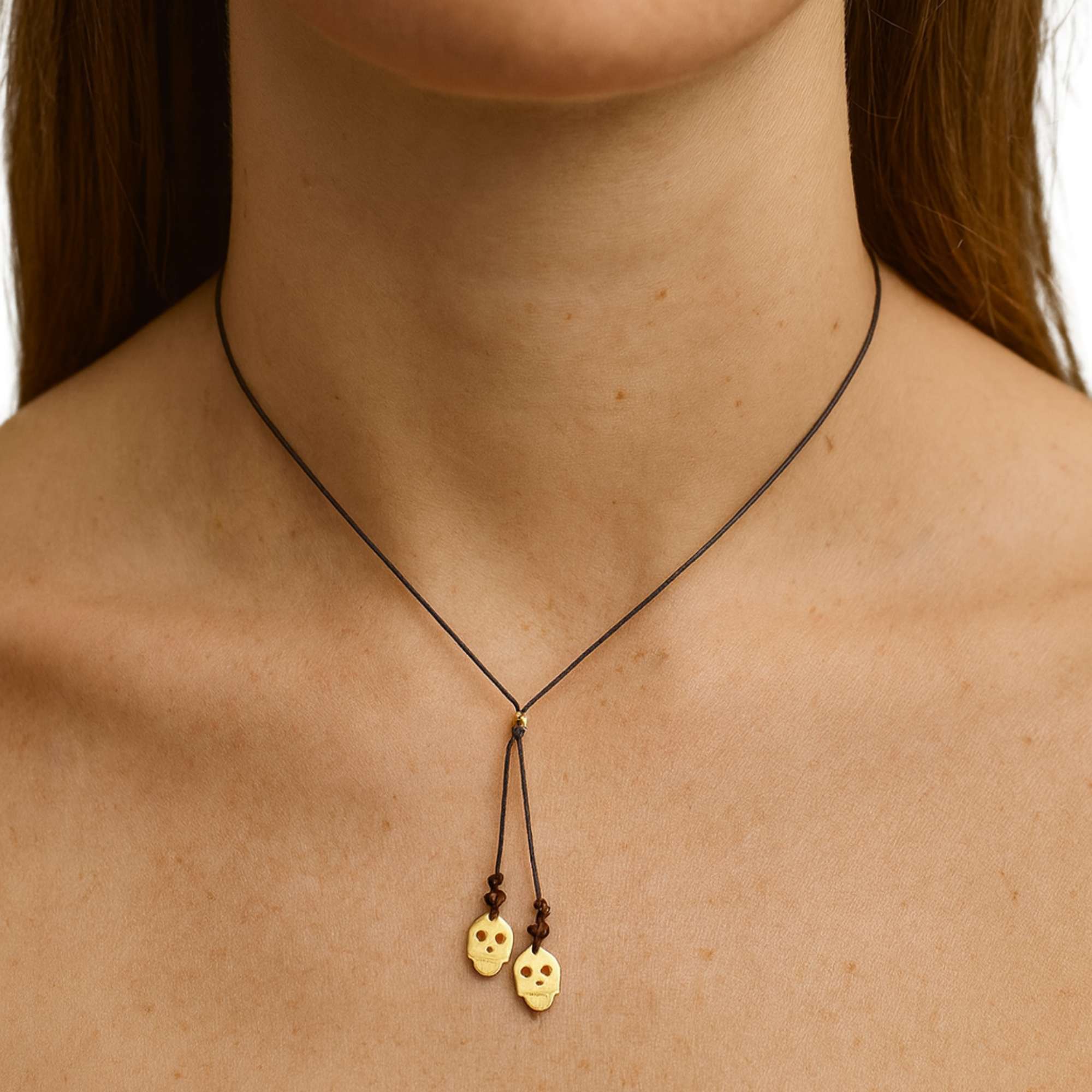 collar dos calaveras